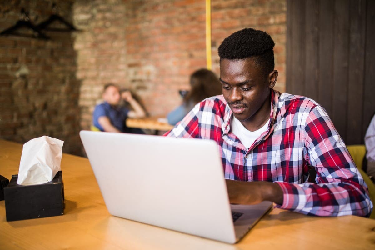 Young person using phone for business